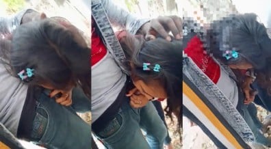 பொது கோவில் குளத்துக்கரை ஓரமாக ஊம்பும் பெண்மணி